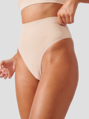 Calcinha Fio Dental Redutora Canelado Sem Costura Premium Bege