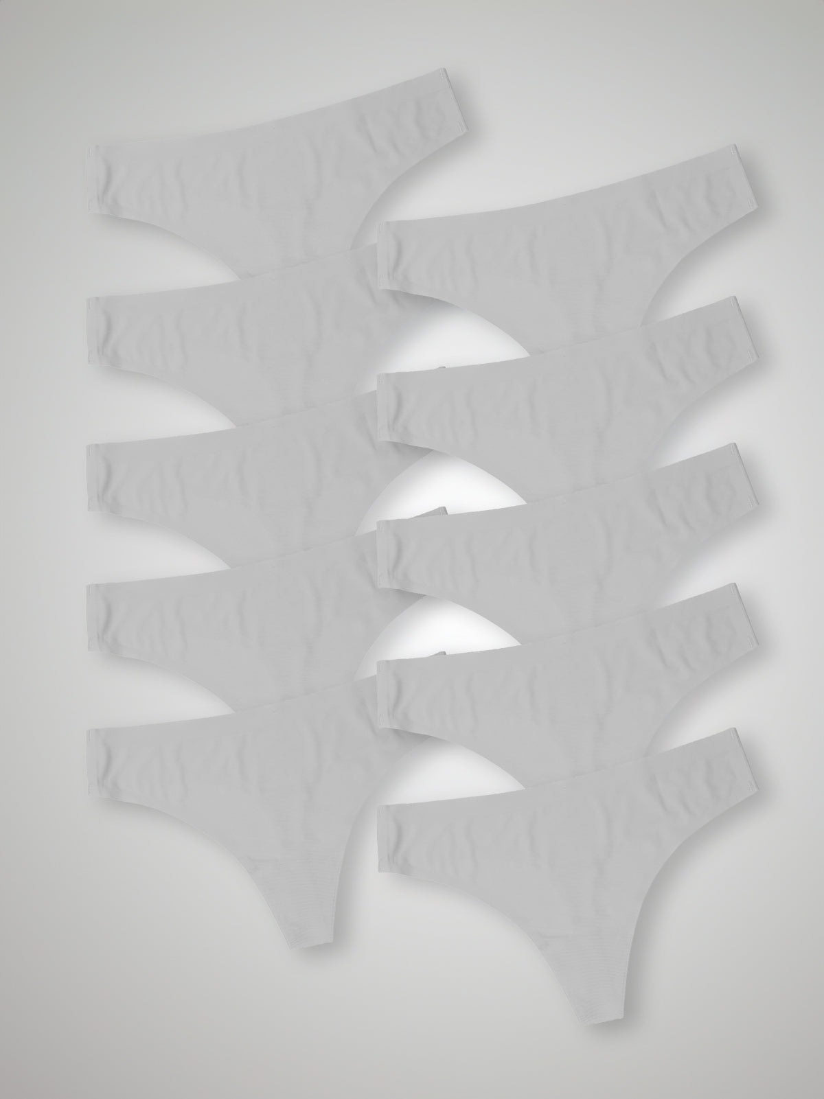 Kit com 10 Calcinhas Fio Dental Sem Costura Segunda Pele Branco - R$18,99 cada